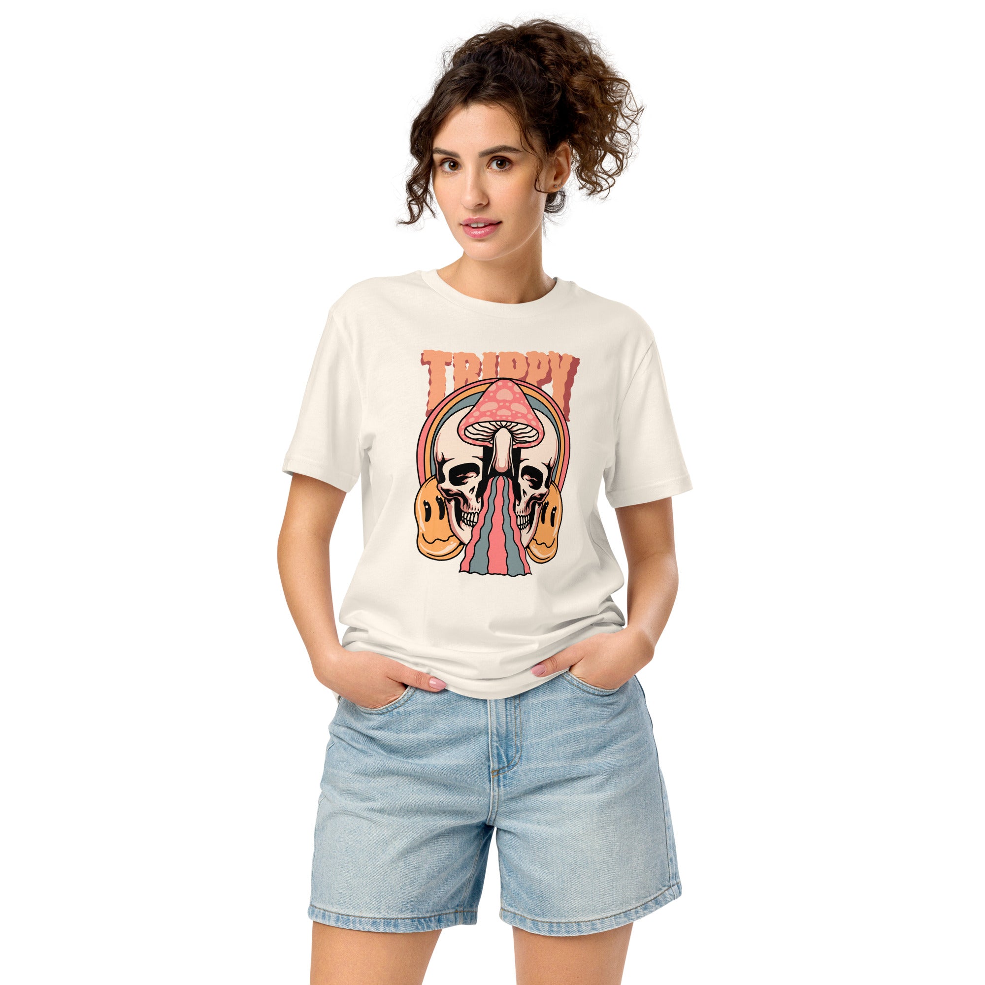 Mid-light organic cotton t-shirt showing a split skull divided by a pink mushroom, with flowing psychedelic shapes and small smiley faces.