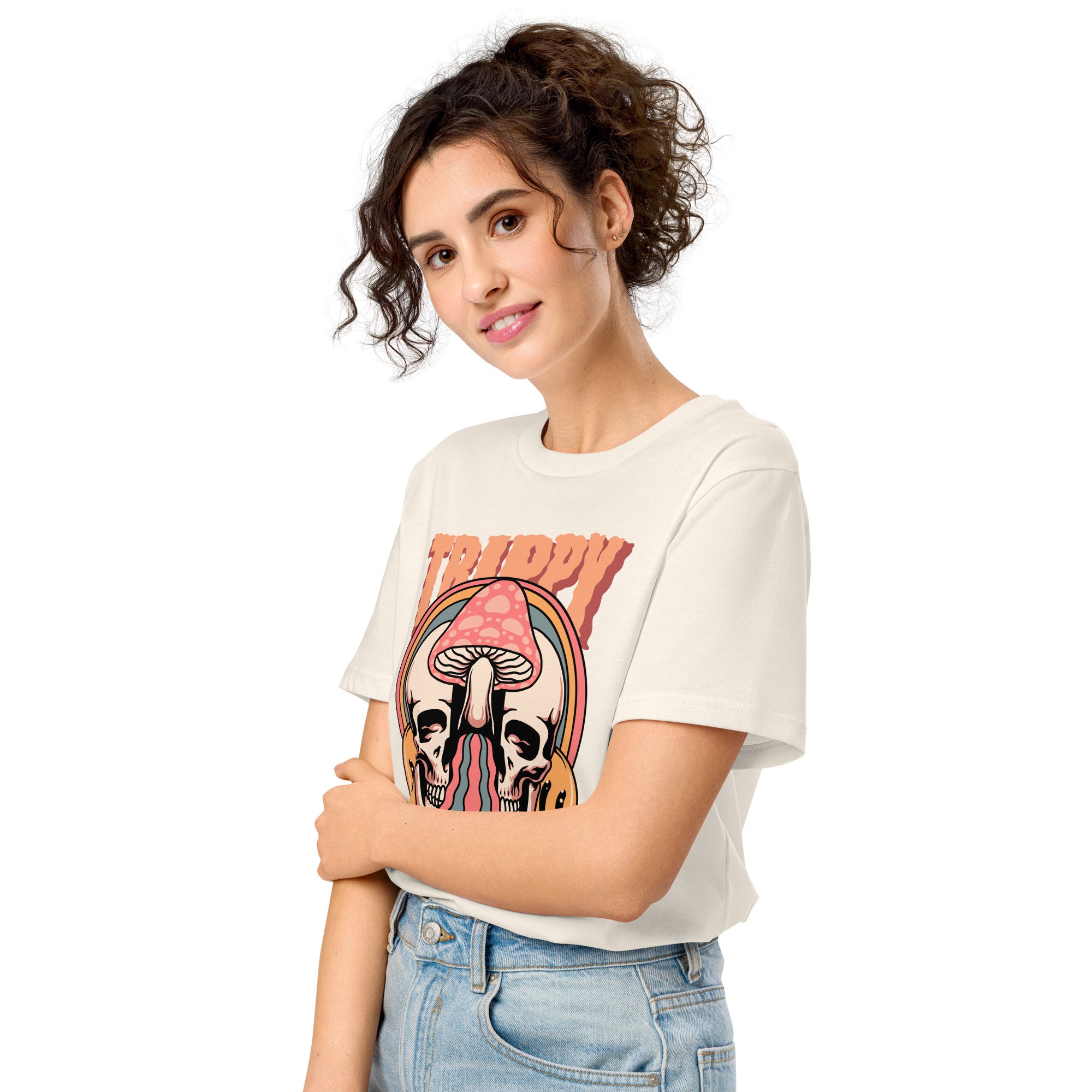 Mid-light organic cotton t-shirt showing a split skull divided by a pink mushroom, with flowing psychedelic shapes and small smiley faces.