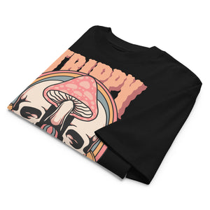 Oversized organic cotton t-shirt showing a split skull pierced by a pink mushroom, with melting psychedelic shapes and small smiley faces.