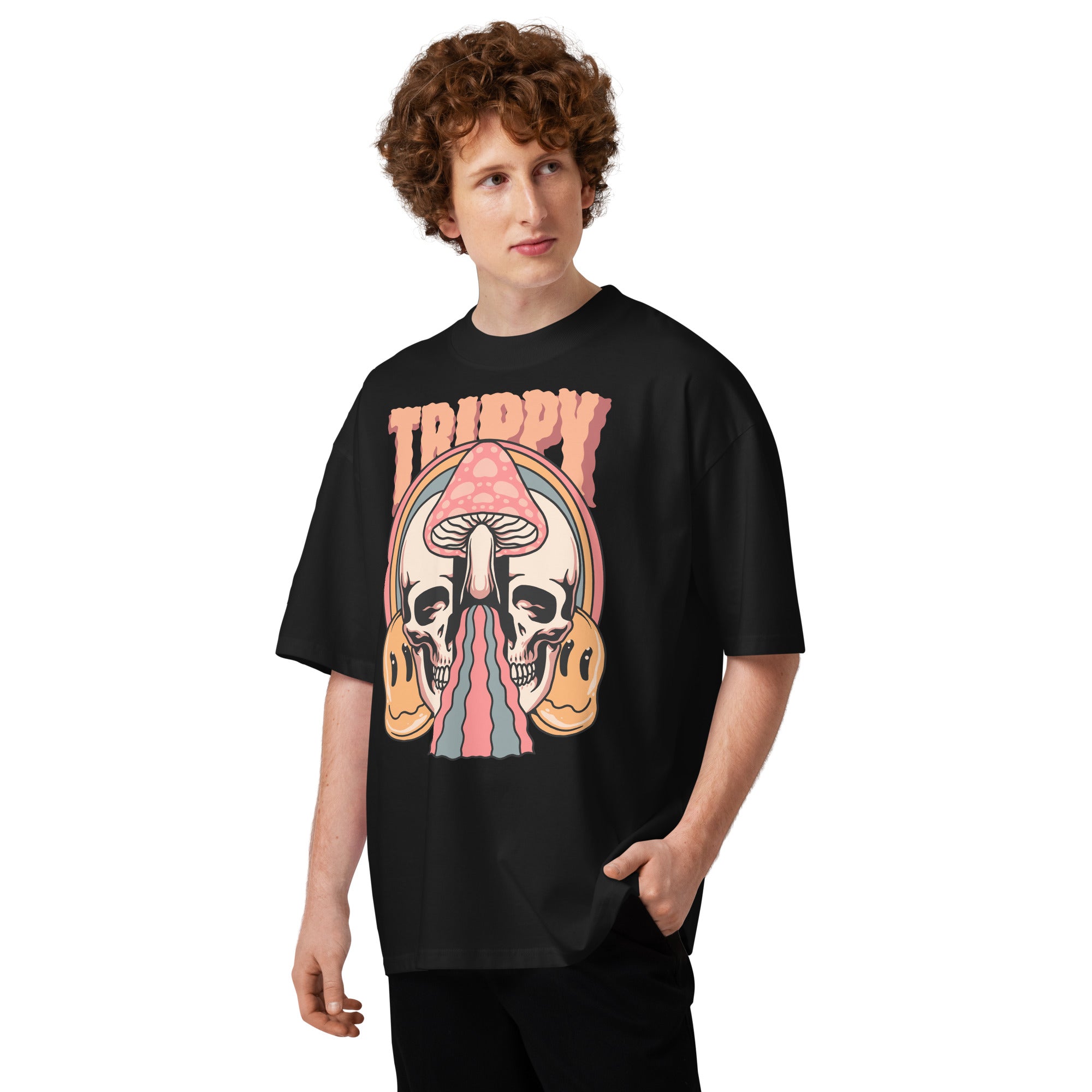 Oversized organic cotton t-shirt showing a split skull pierced by a pink mushroom, with melting psychedelic shapes and small smiley faces.
