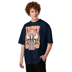 Oversized organic cotton t-shirt showing a split skull pierced by a pink mushroom, with melting psychedelic shapes and small smiley faces.