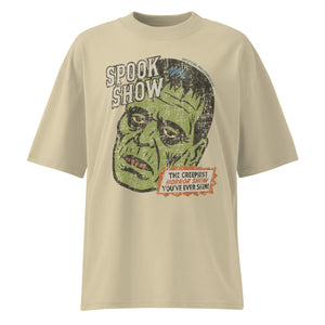 Distressed Frankenstein head with “Spook Show” on a premium organic oversized stone t-shirt.