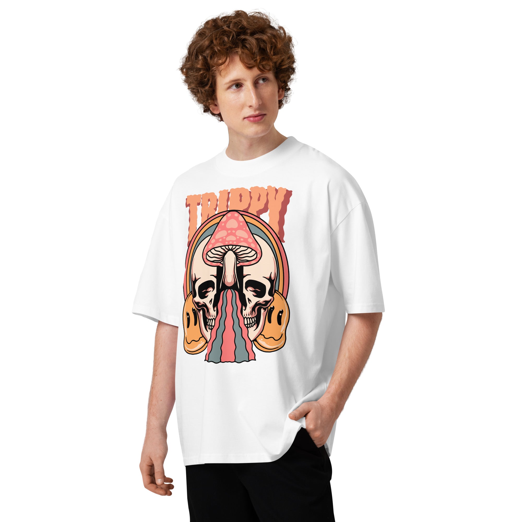 Oversized organic cotton t-shirt showing a split skull pierced by a pink mushroom, with melting psychedelic shapes and small smiley faces.