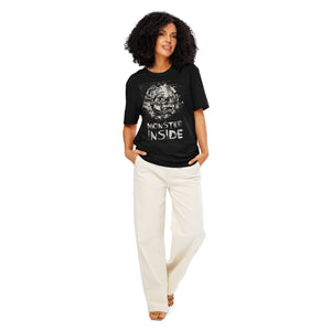 Black heavyweight organic cotton t-shirt featuring horned monster emerging from a ritual circle with fragmented script.
