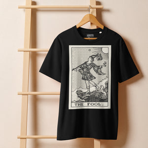 Heavyweight organic cotton t-shirt with The Fool tarot illustration rendered in modern woodcut style.