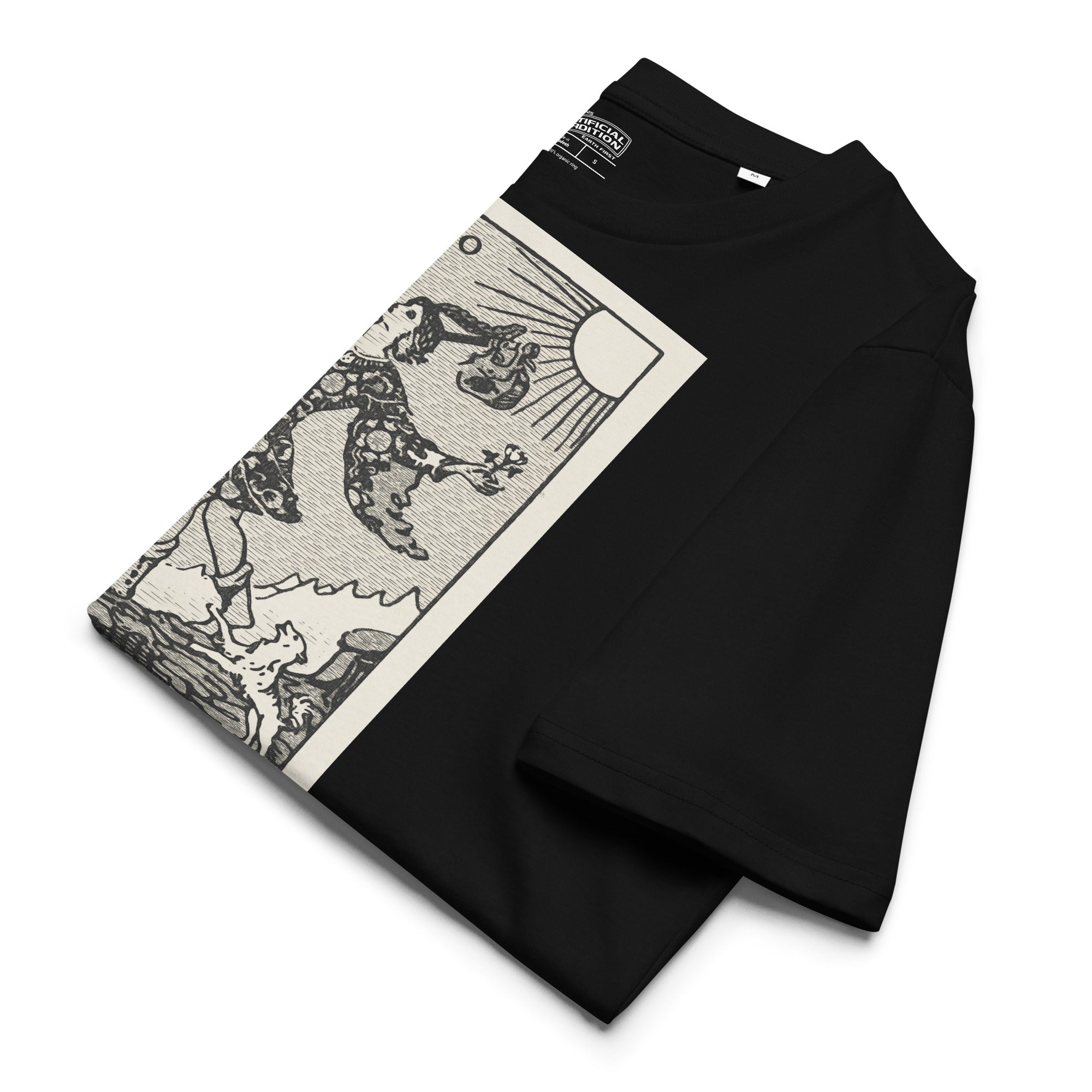 Heavyweight organic cotton t-shirt with The Fool tarot illustration rendered in modern woodcut style.