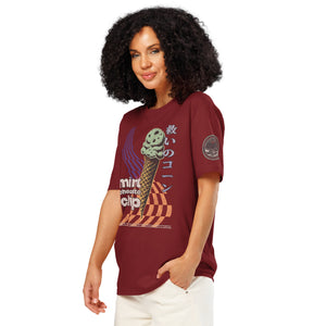 The left facing side of a woman wearing a burgundy heavyweight tee featuring the words "mint chocolate chip" wit a neon mint chip cone and the Japanese kanji 救いのコーン (Sukui no kōn) — “Cone of Salvation." There is a circular badge of mothman over a bridge with the words "artificial perdition | myths & legends."