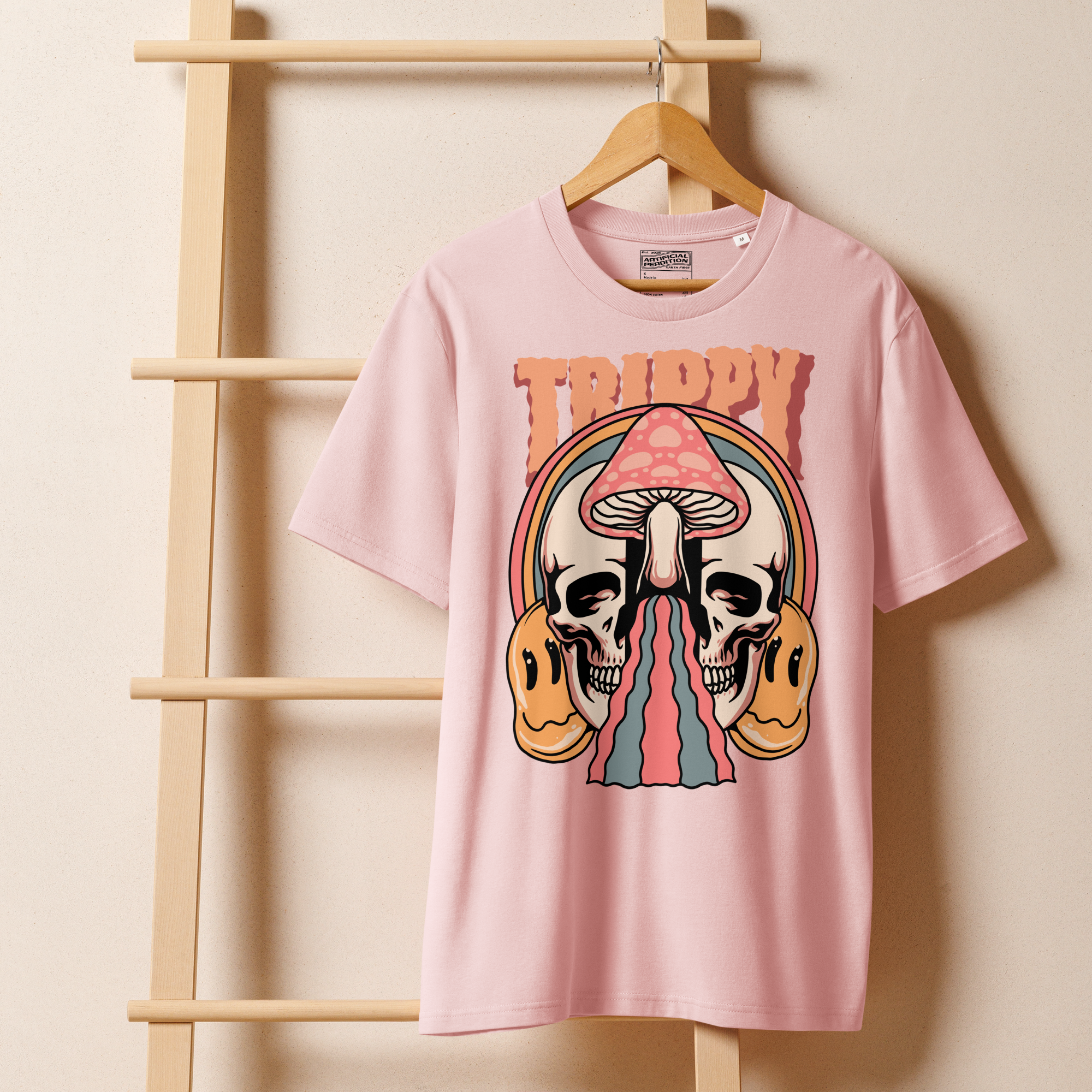Heavyweight organic cotton t-shirt featuring a split skull pierced by a pink mushroom, with melting psychedelic shapes and small smiley faces.