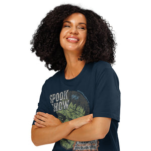 A woman standing with arms crossed wearing a distressed Frankenstein head with “Spook Show” on a premium organic  heavyweight French Navy t-shirt.