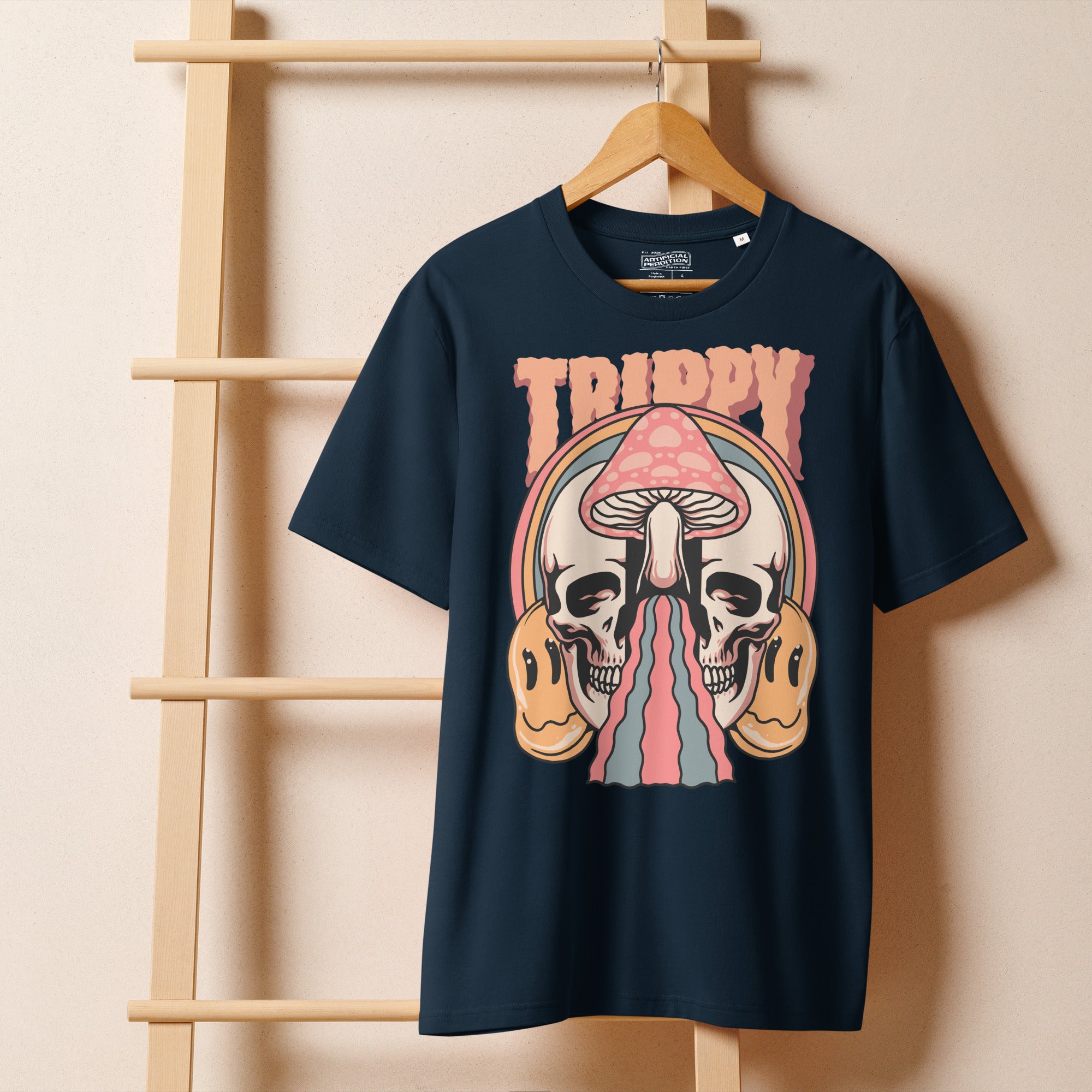 Heavyweight organic cotton t-shirt featuring a split skull pierced by a pink mushroom, with melting psychedelic shapes and small smiley faces.