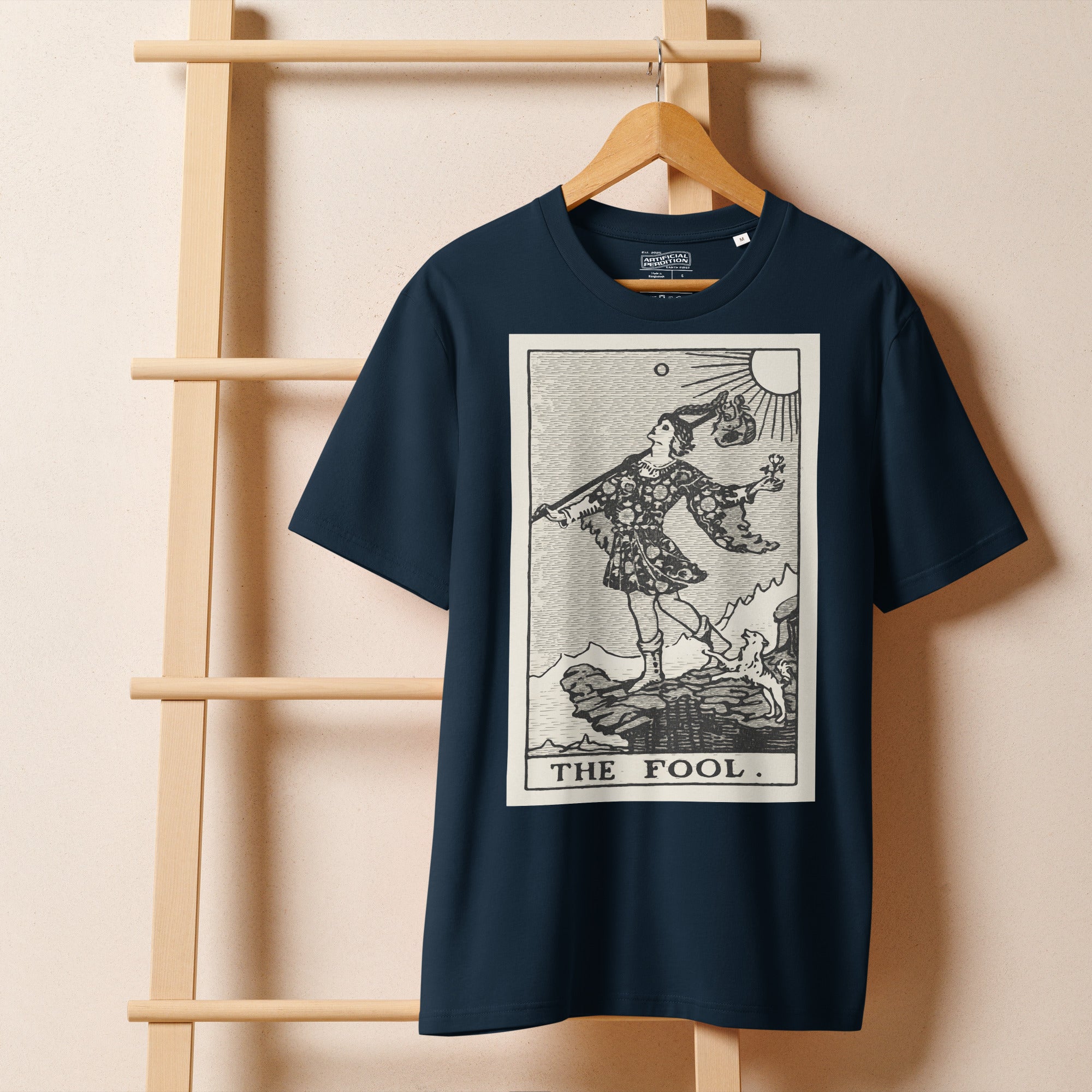 Heavyweight organic cotton t-shirt with The Fool tarot illustration rendered in modern woodcut style.