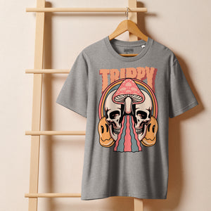 Heavyweight organic cotton t-shirt featuring a split skull pierced by a pink mushroom, with melting psychedelic shapes and small smiley faces.
