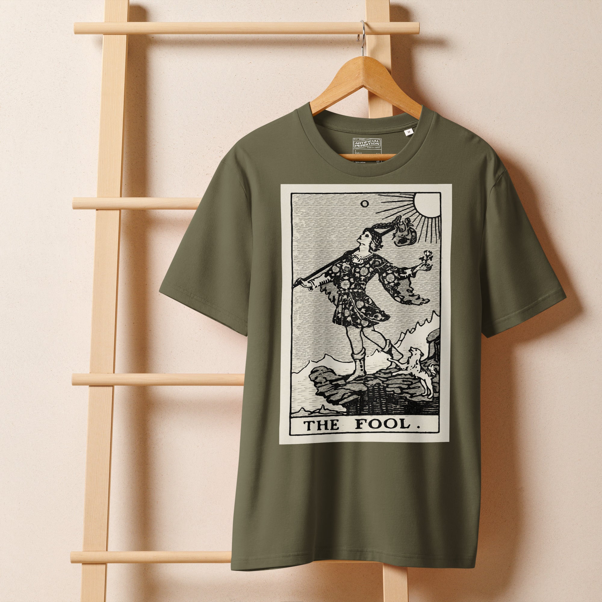 Heavyweight organic cotton t-shirt with The Fool tarot illustration rendered in modern woodcut style.