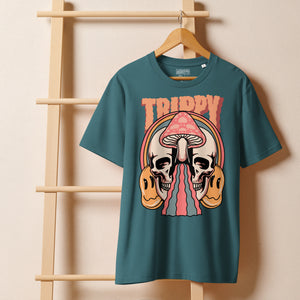 Heavyweight organic cotton t-shirt featuring a split skull pierced by a pink mushroom, with melting psychedelic shapes and small smiley faces.