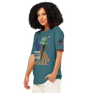 The left facing side of a woman wearing a stargazer heavyweight tee featuring the words "mint chocolate chip" wit a neon mint chip cone and the Japanese kanji 救いのコーン (Sukui no kōn) — “Cone of Salvation." There is a circular badge of mothman over a bridge with the words "artificial perdition | myths & legends."