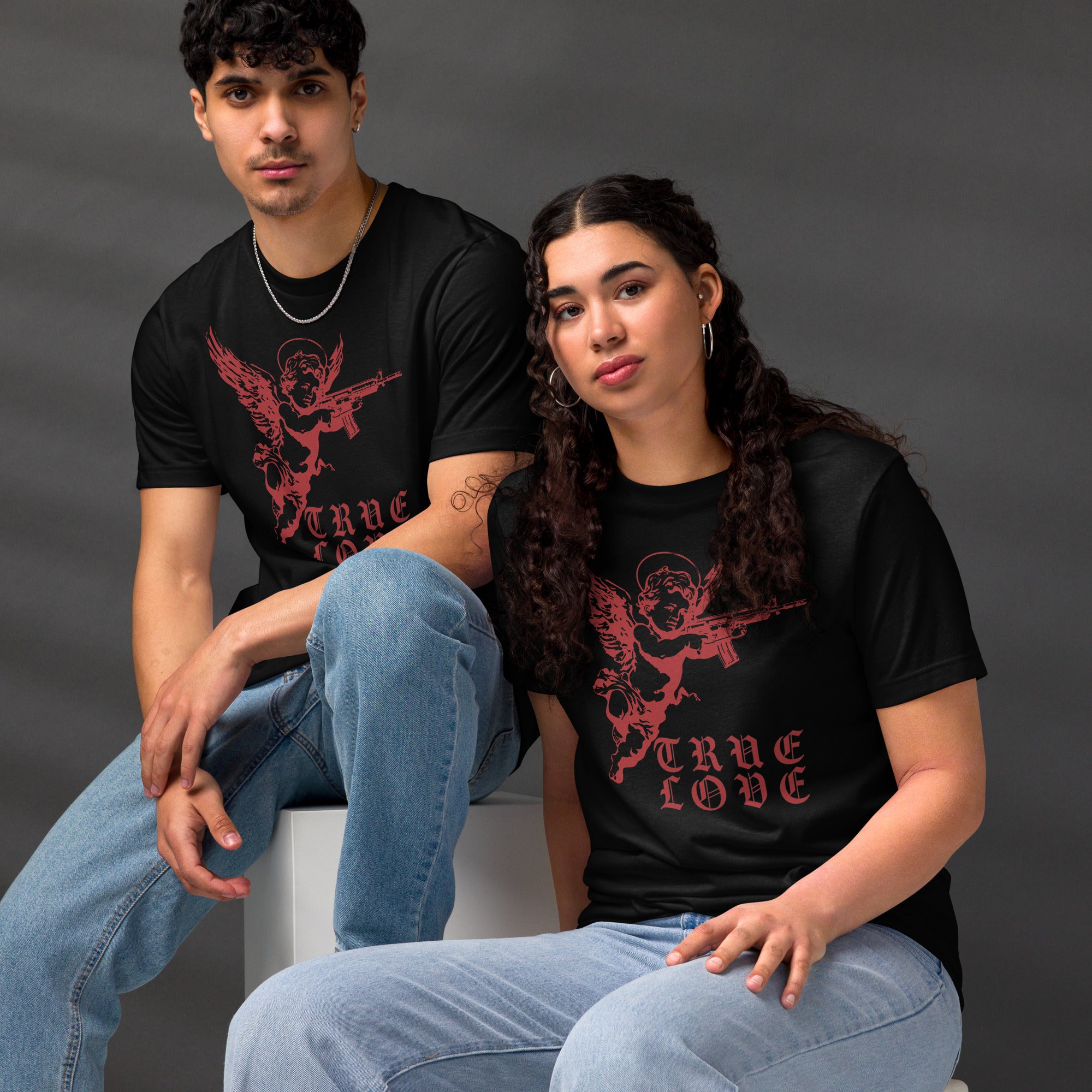 The cherub traded the bow for something heavier. True Love was never gentle. Dark irony apparel from Artificial Perdition.