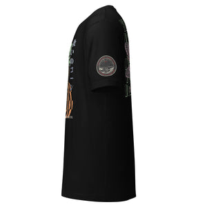 The front of a black core tee featuring a circular badge of Mothman over a bridge with the words "artificial perdition | myths and legends," on the left sleeve.