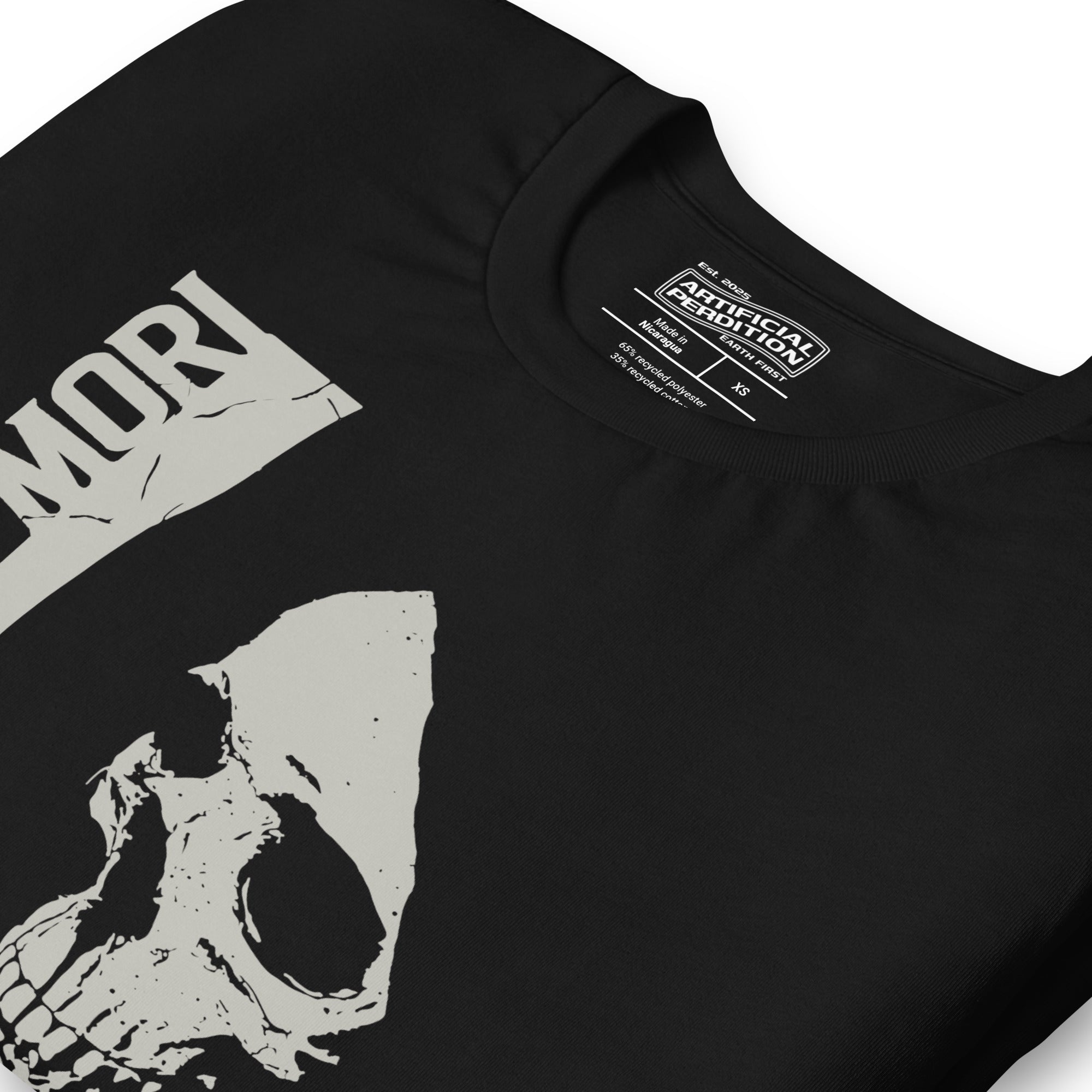 Cracked skull illustration in tombstone grey with vertical Memento Mori text and Remember Death translation, Artificial Perdition apparel