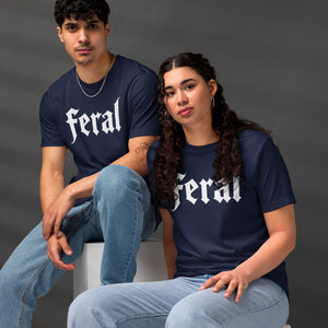 Feral in white blackletter font on dark heather grey t-shirt, bold single word graphic design, Artificial Perdition apparel
