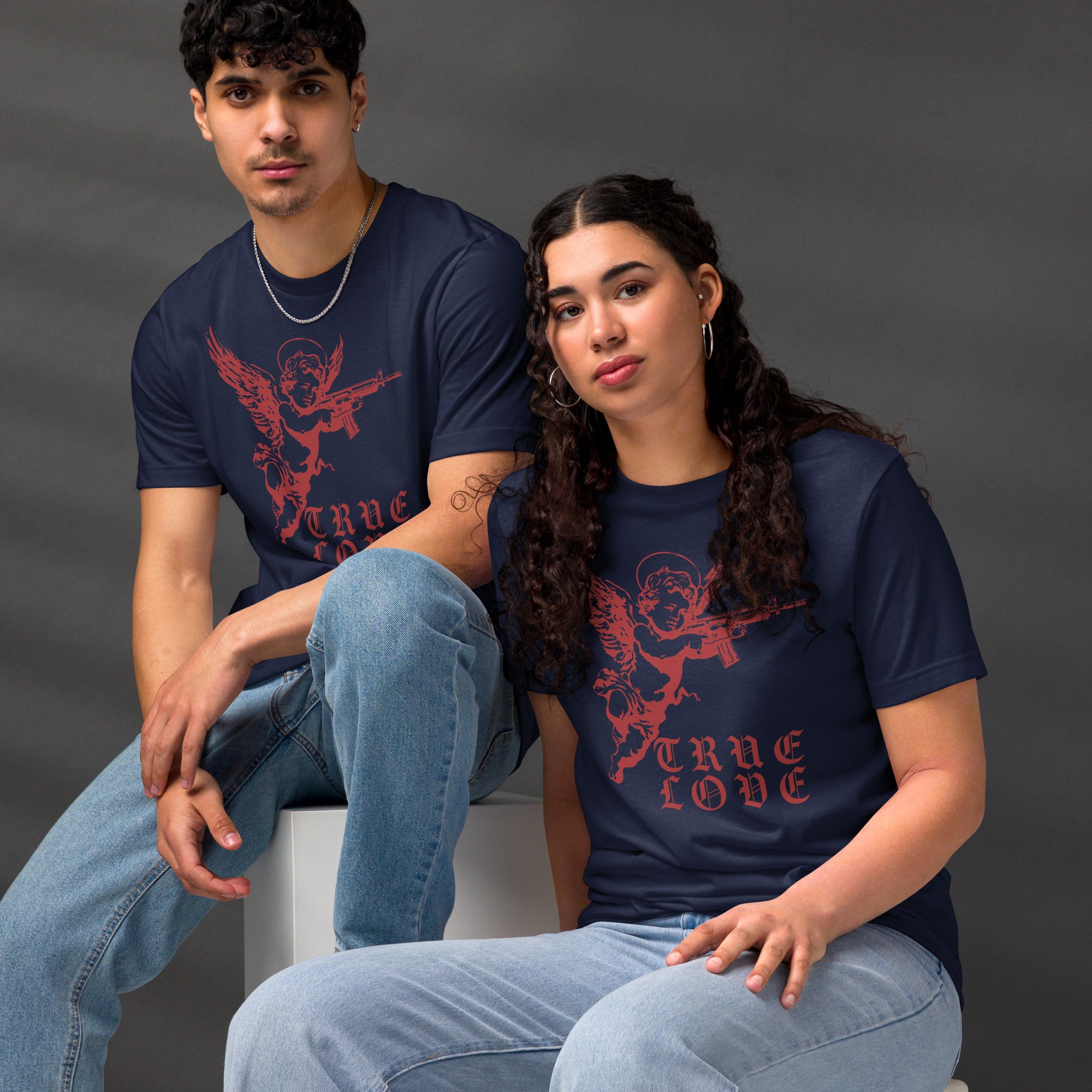 The cherub traded the bow for something heavier. True Love was never gentle. Dark irony apparel from Artificial Perdition.