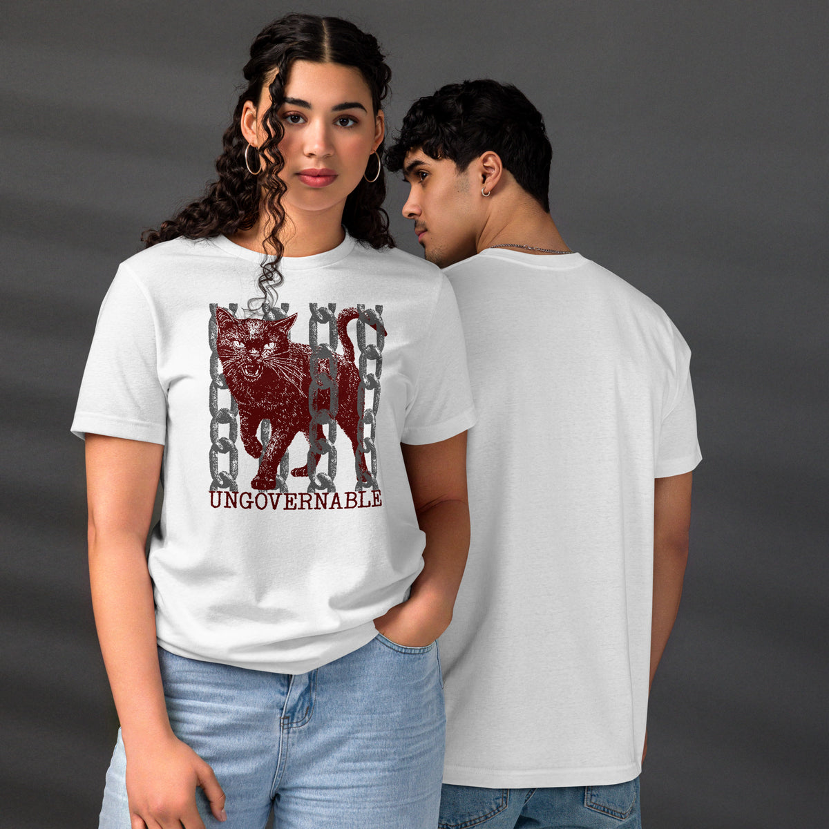Product mockupSnarling cat breaking through chains with UNGOVERNABLE text, dithered halftone red on cream, Artificial Perdition apparel