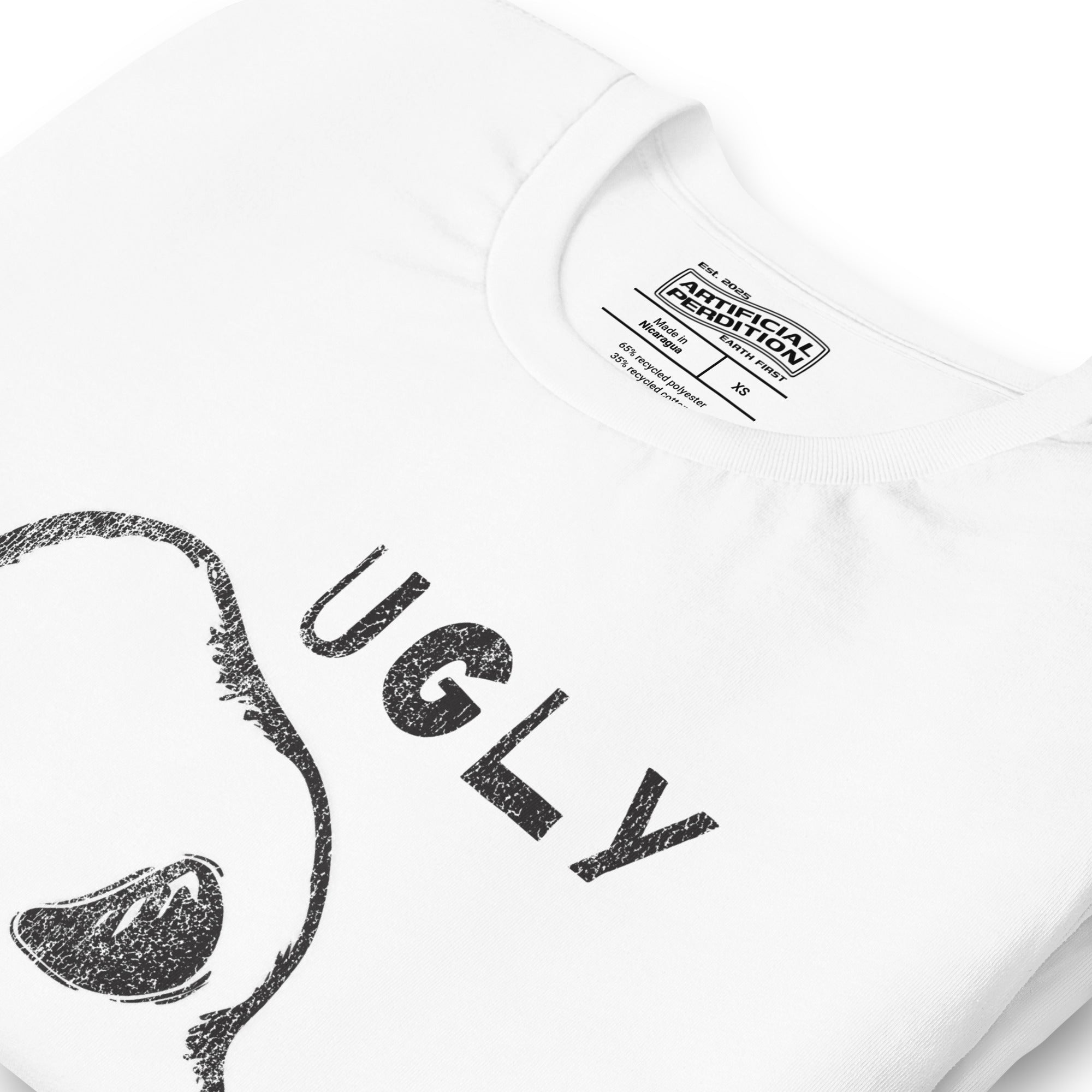Crude hand-drawn skull with mismatched eye sockets and UGLY text in the upper corner, anti-polish graphic design, Artificial Perdition apparel