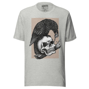 Product mockupGraphite illustration of a black corvid perched on a human skull removing the eye, sprouting branch beside it, Last Look, Artificial Perdition apparel