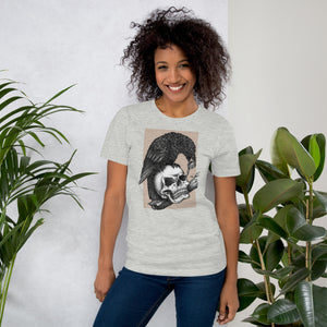 Graphite illustration of a black corvid perched on a human skull removing the eye, sprouting branch beside it, Last Look, Artificial Perdition apparel