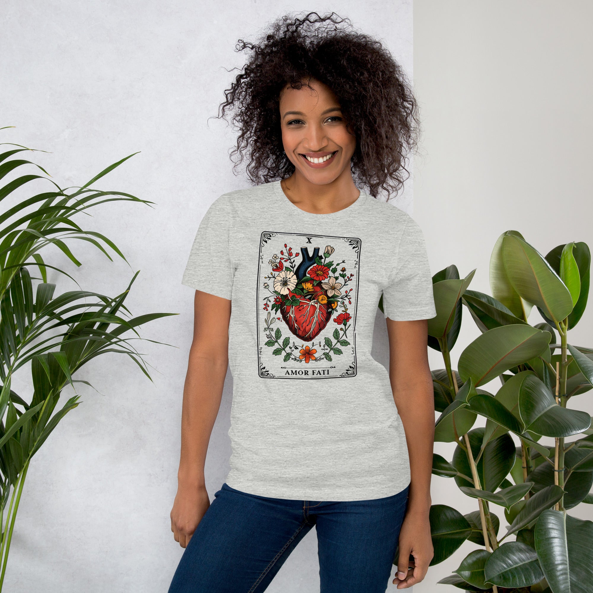 Tarot card illustration numbered X with an anatomical heart in bloom surrounded by wildflowers and vines, Amor Fati, Artificial Perdition apparel