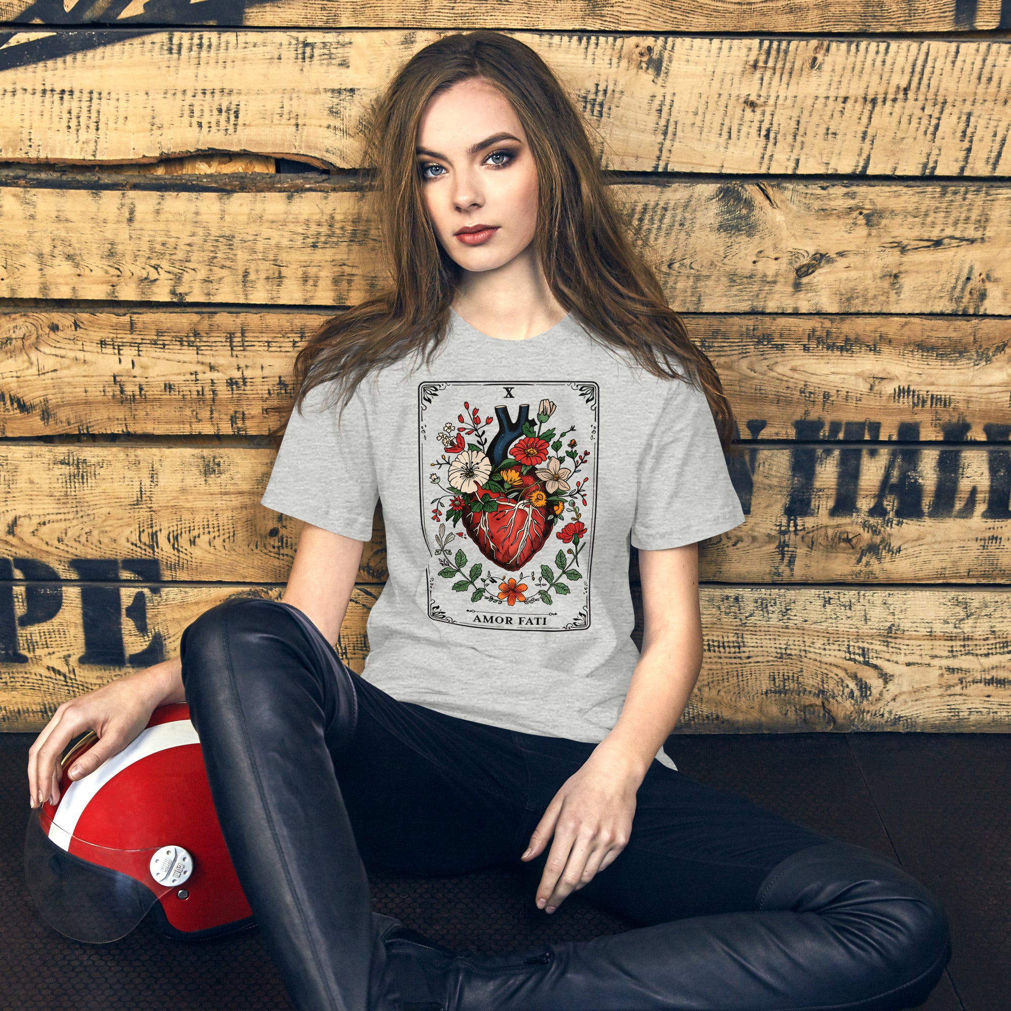 Tarot card illustration numbered X with an anatomical heart in bloom surrounded by wildflowers and vines, Amor Fati, Artificial Perdition apparel