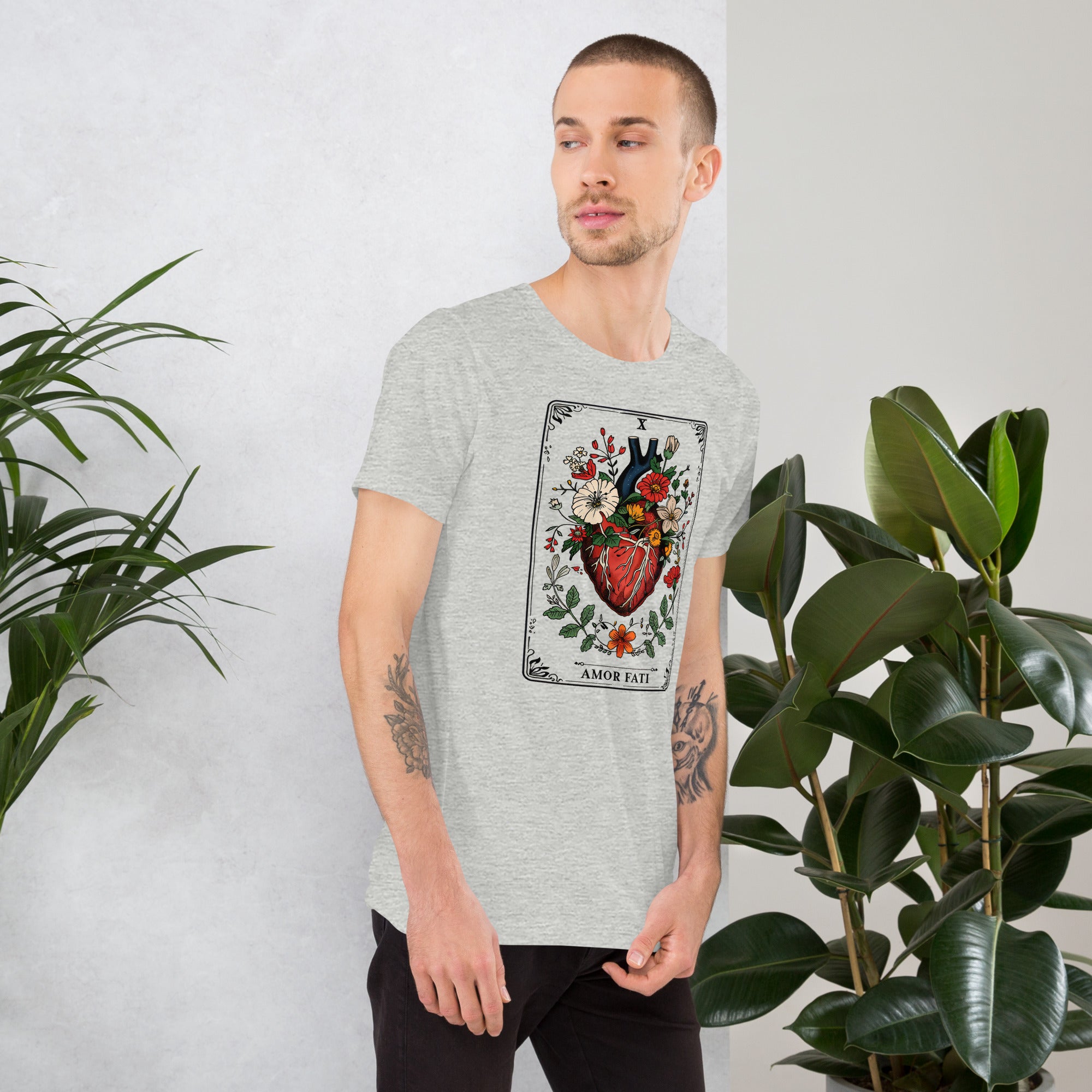 Tarot card illustration numbered X with an anatomical heart in bloom surrounded by wildflowers and vines, Amor Fati, Artificial Perdition apparel