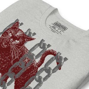 Snarling cat breaking through chains with UNGOVERNABLE text, dithered halftone red on cream, Artificial Perdition apparel