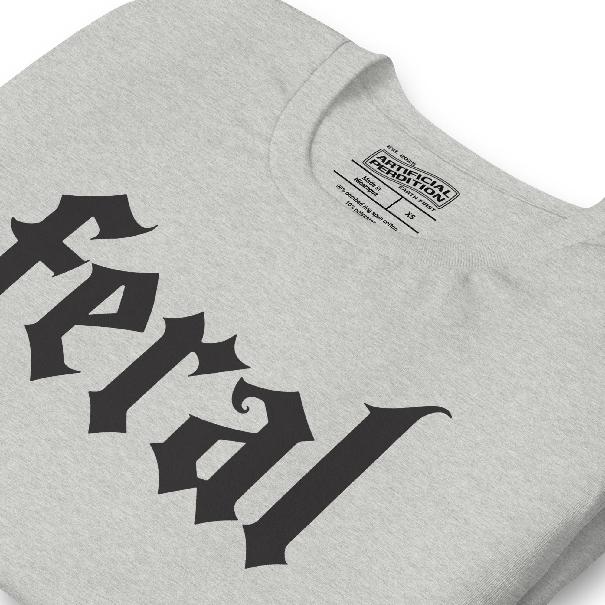 Feral in white blackletter font on dark heather grey t-shirt, bold single word graphic design, Artificial Perdition apparel