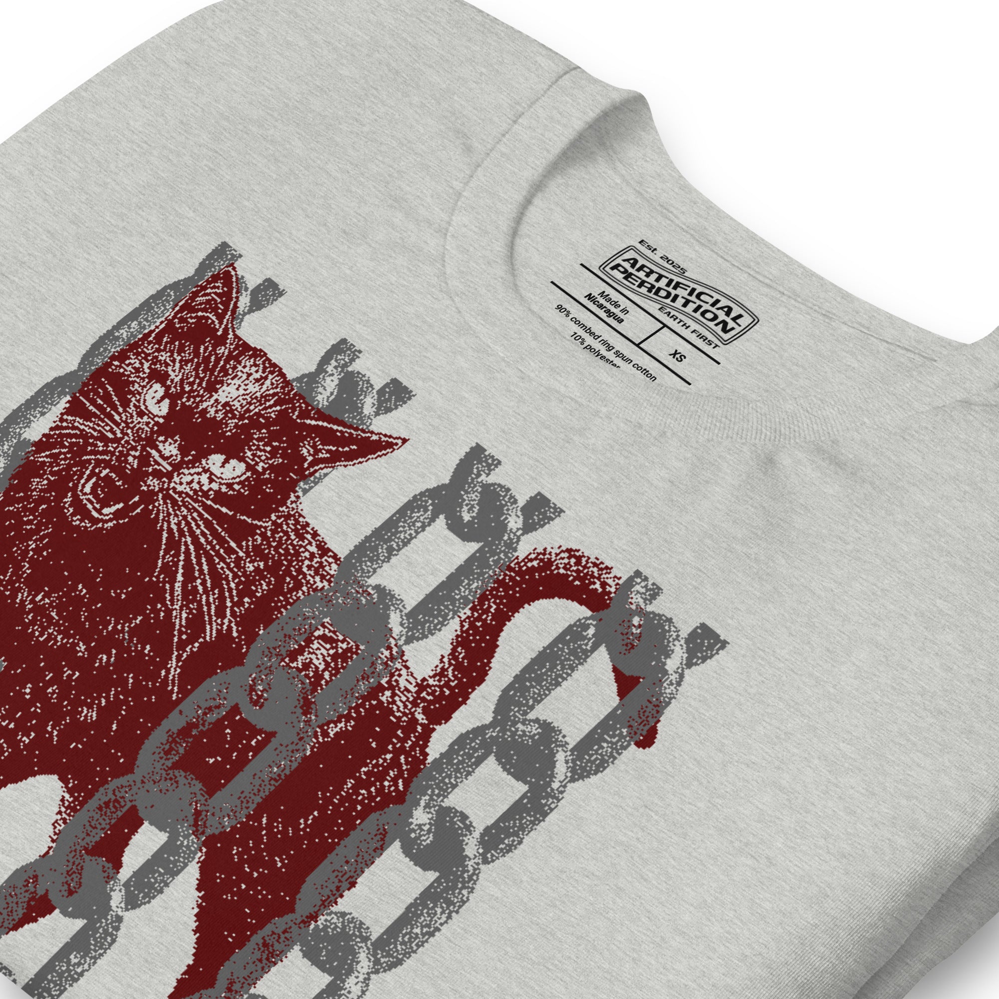 Product mockupSnarling cat breaking through chains with UNGOVERNABLE text, dithered halftone red on cream, Artificial Perdition apparel