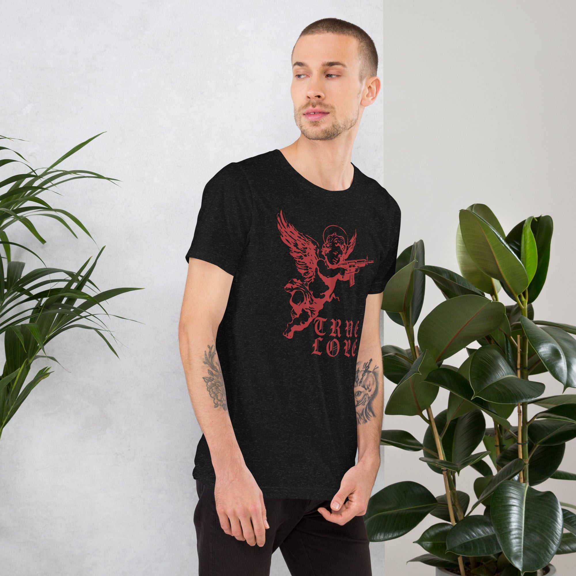 Red cherub angel with halo aiming rifle above blackletter True Love text, dark ironic tattoo flash style, Artificial Perdition apparel