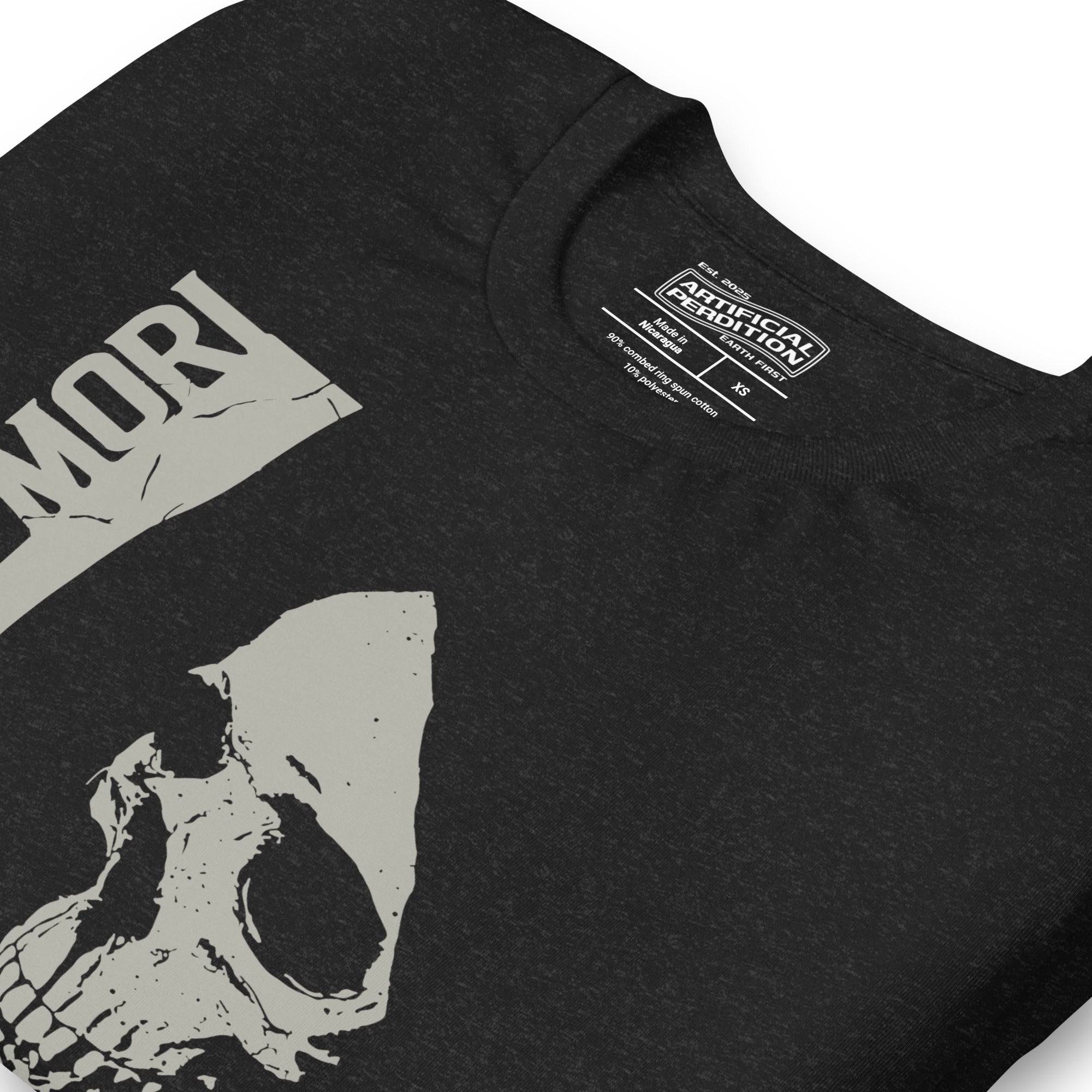 Cracked skull illustration in tombstone grey with vertical Memento Mori text and Remember Death translation, Artificial Perdition apparel