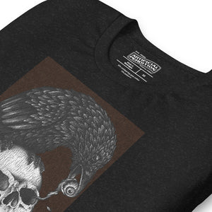 Graphite illustration of a black corvid perched on a human skull removing the eye, sprouting branch beside it, Last Look, Artificial Perdition apparel