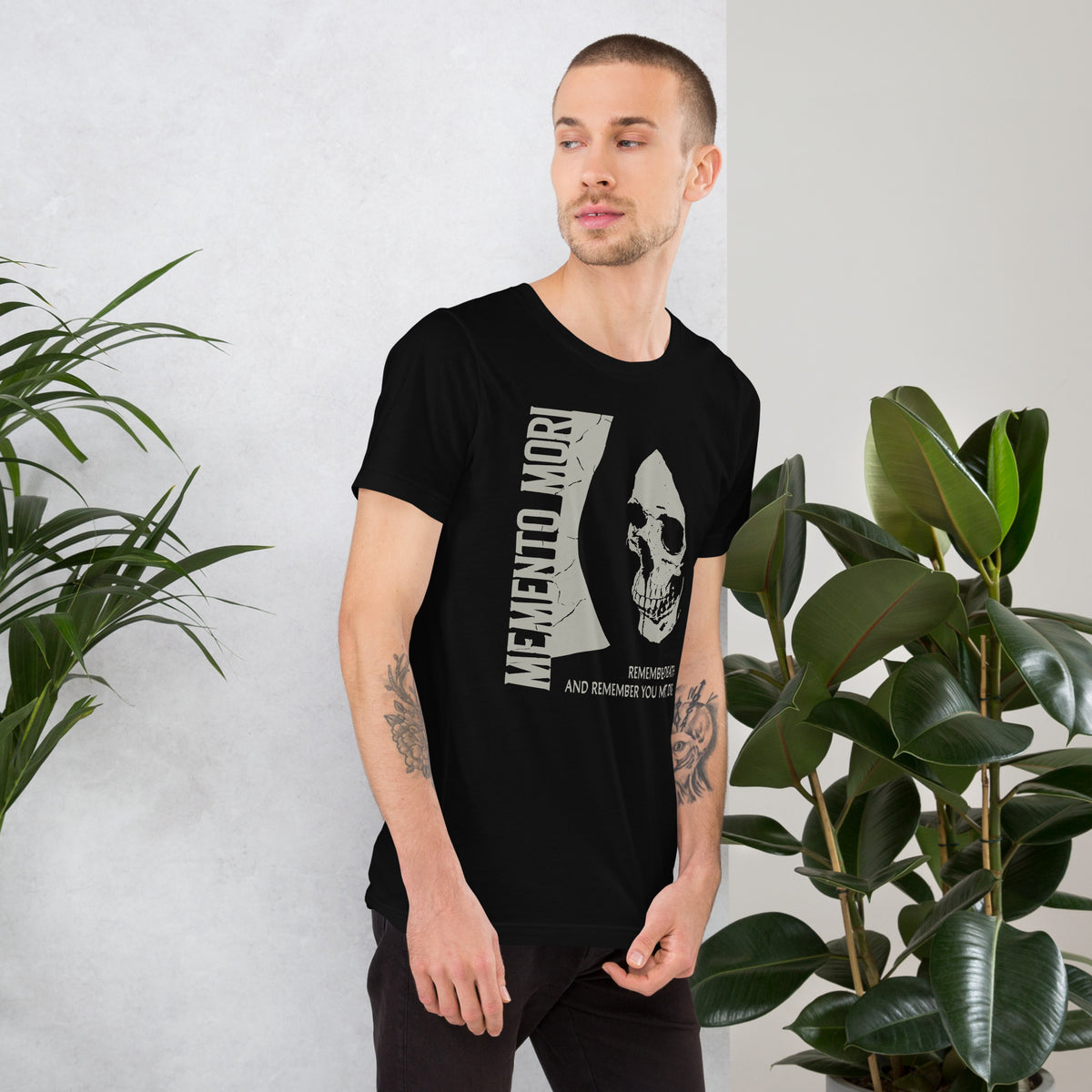 Cracked skull illustration in tombstone grey with vertical Memento Mori text and Remember Death translation, Artificial Perdition apparel