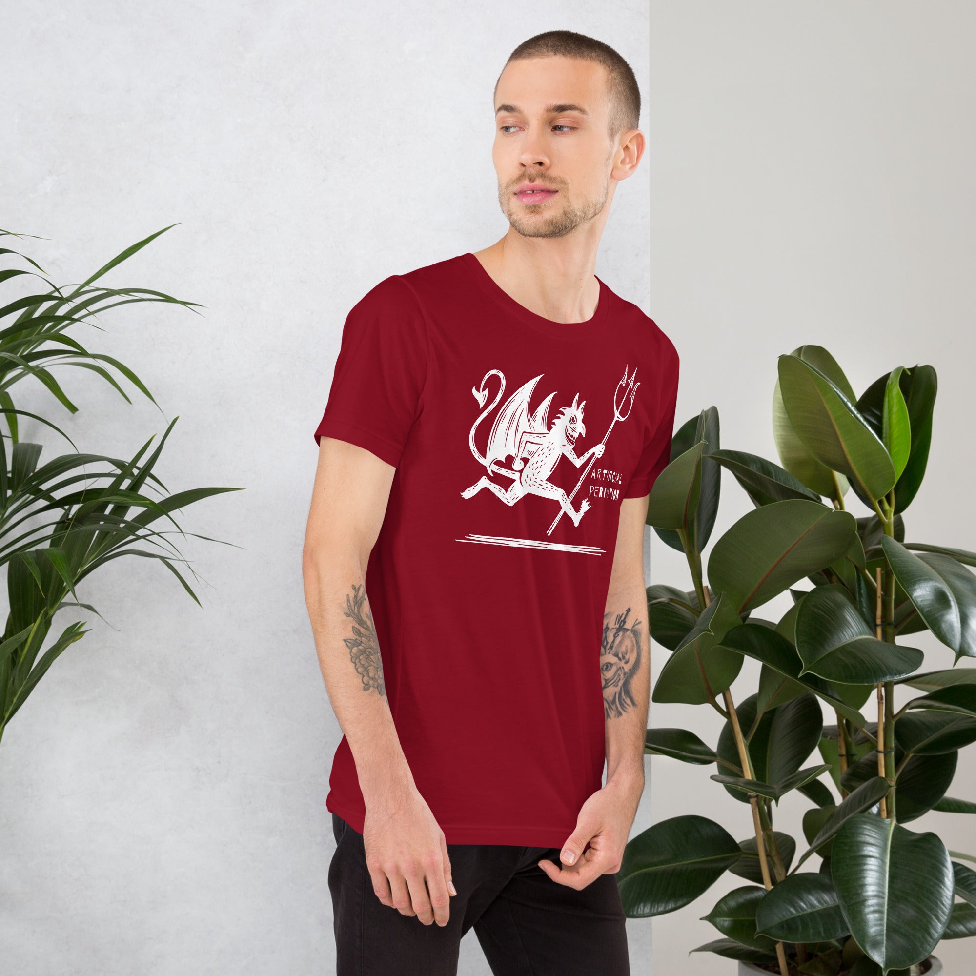 Artificial Perdition devil mascot, red illustrated devil mid-stride with trident and brand name, hand-drawn style on black, official logo tee