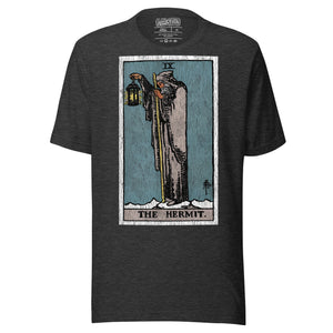 Product mockupThe Hermit tarot card, hooded robed figure on snowy summit holding a staff and lantern with star inside, Rider-Waite style, Artificial Perdition