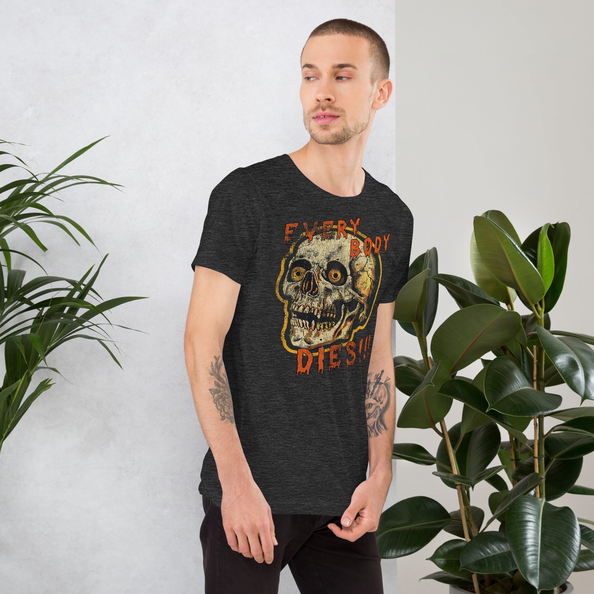 Die-cut skull with amber eyes and dripping orange horror font reading EVERY BODY DIES, vintage pulp style, Artificial Perdition apparel