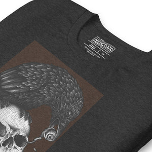 Graphite illustration of a black corvid perched on a human skull removing the eye, sprouting branch beside it, Last Look, Artificial Perdition apparel