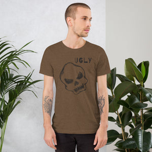 Crude hand-drawn skull with mismatched eye sockets and UGLY text in the upper corner, anti-polish graphic design, Artificial Perdition apparel