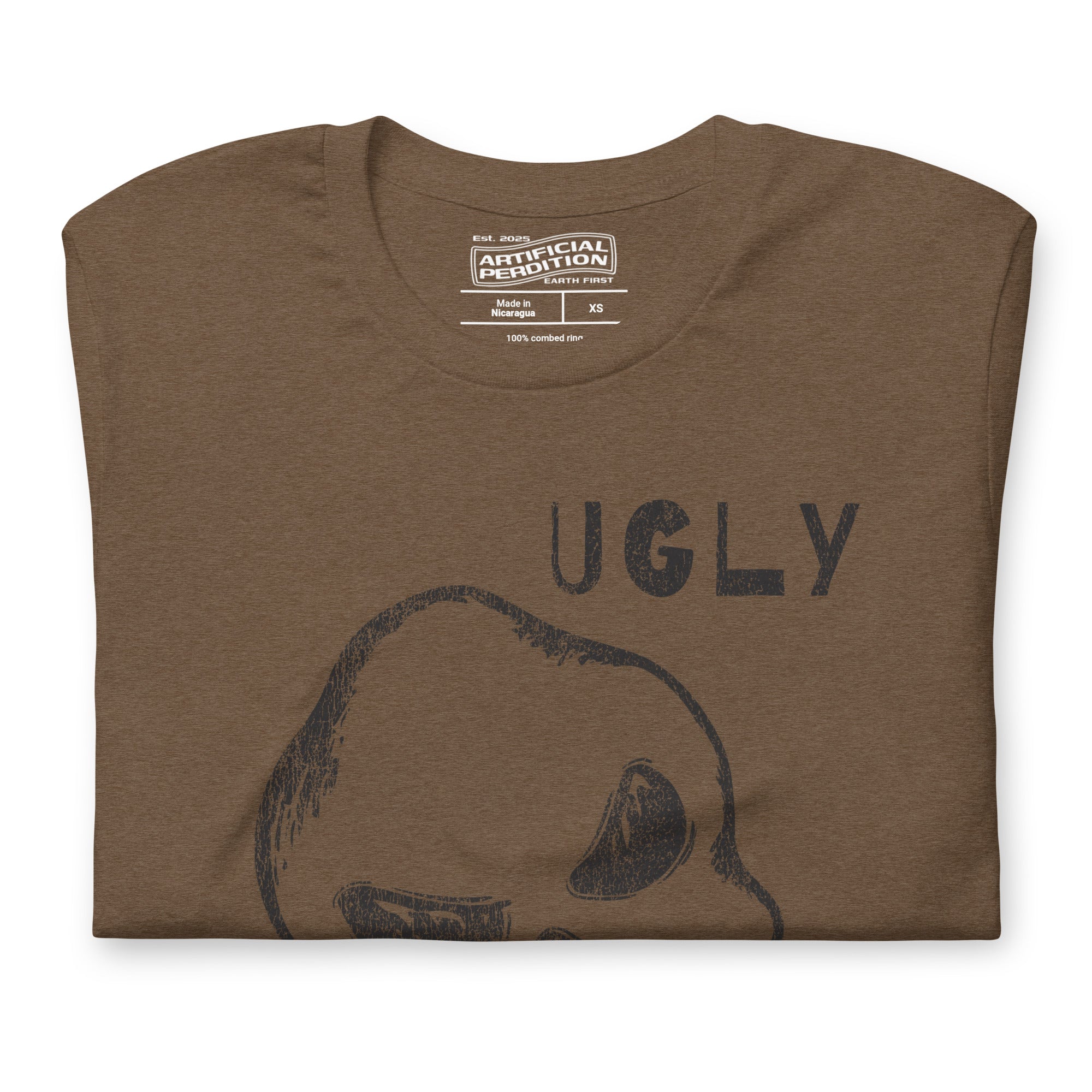 Crude hand-drawn skull with mismatched eye sockets and UGLY text in the upper corner, anti-polish graphic design, Artificial Perdition apparel