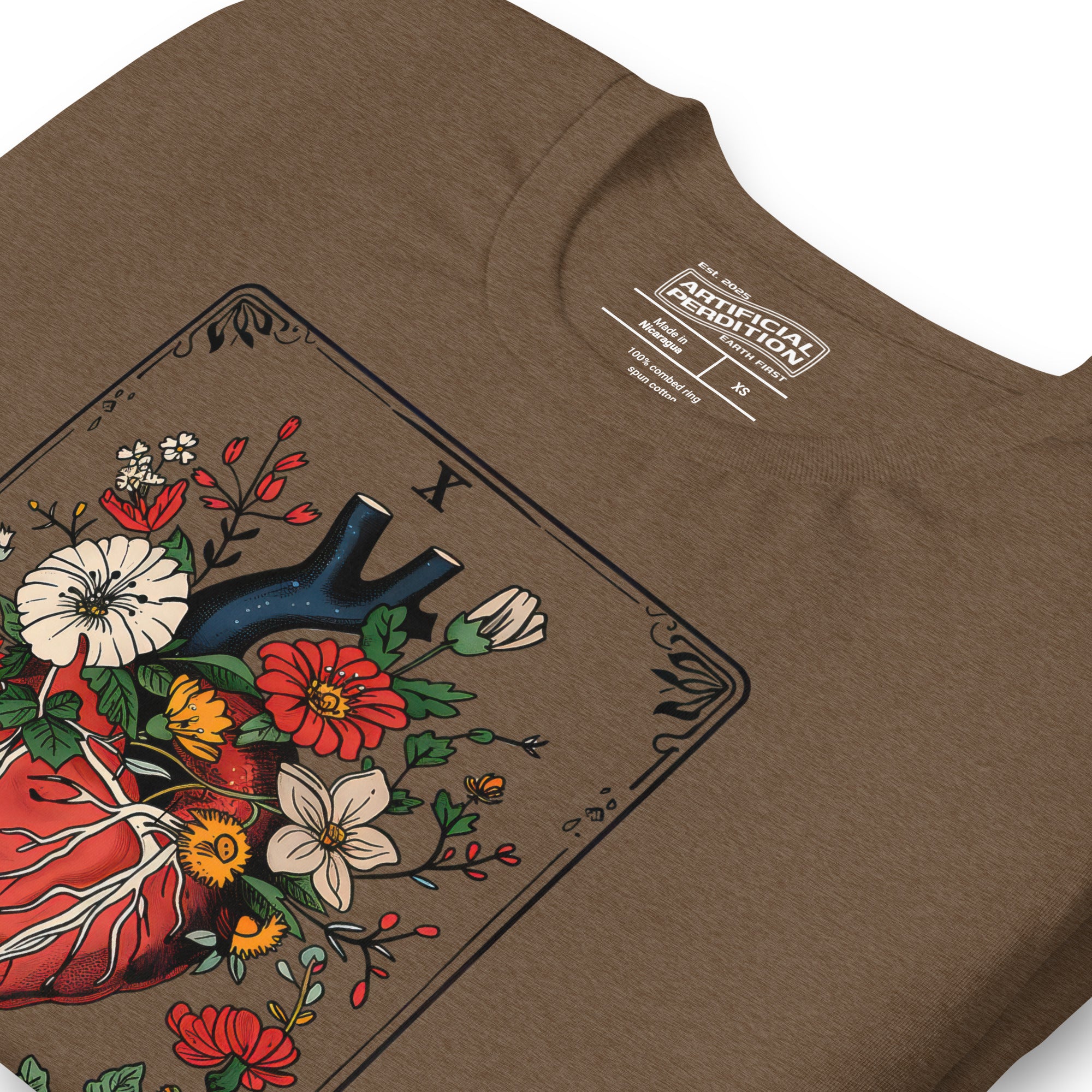 Tarot card illustration numbered X with an anatomical heart in bloom surrounded by wildflowers and vines, Amor Fati, Artificial Perdition apparel