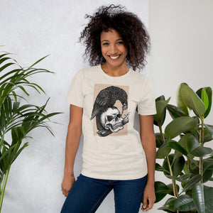 Graphite illustration of a black corvid perched on a human skull removing the eye, sprouting branch beside it, Last Look, Artificial Perdition apparel