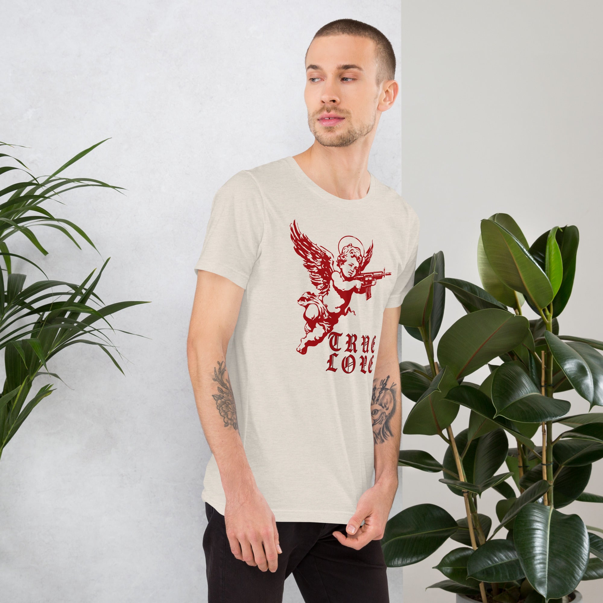 Red cherub angel with halo aiming rifle above blackletter True Love text, dark ironic tattoo flash style, Artificial Perdition apparel
