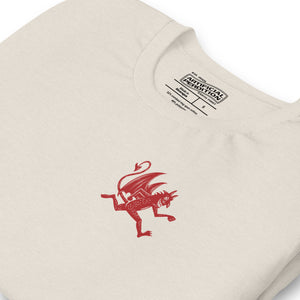 Artificial Perdition devil mascot, red illustrated devil mid-stride with trident and brand name, hand-drawn style on black, official logo tee