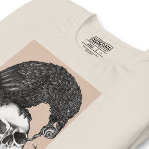 Graphite illustration of a black corvid perched on a human skull removing the eye, sprouting branch beside it, Last Look, Artificial Perdition apparel