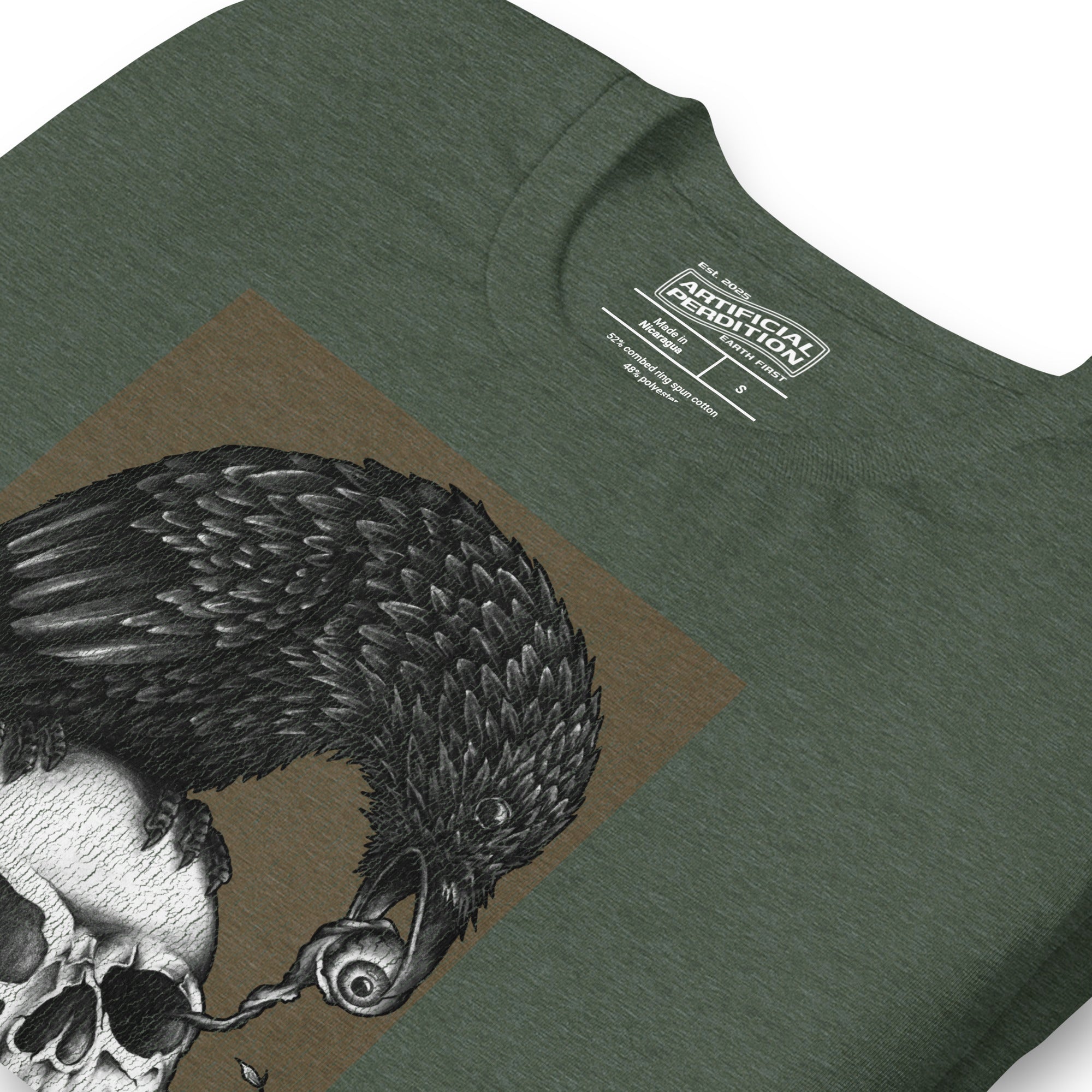 Graphite illustration of a black corvid perched on a human skull removing the eye, sprouting branch beside it, Last Look, Artificial Perdition apparel